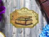 The Lore Chronicler Metallic Sticker The Lore Chronicler Metallic Sticker
