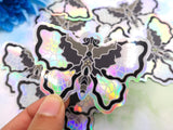 Moth Messengers Holographic Stickers (2 designs) Moth Messengers Holographic Stickers (2 designs)